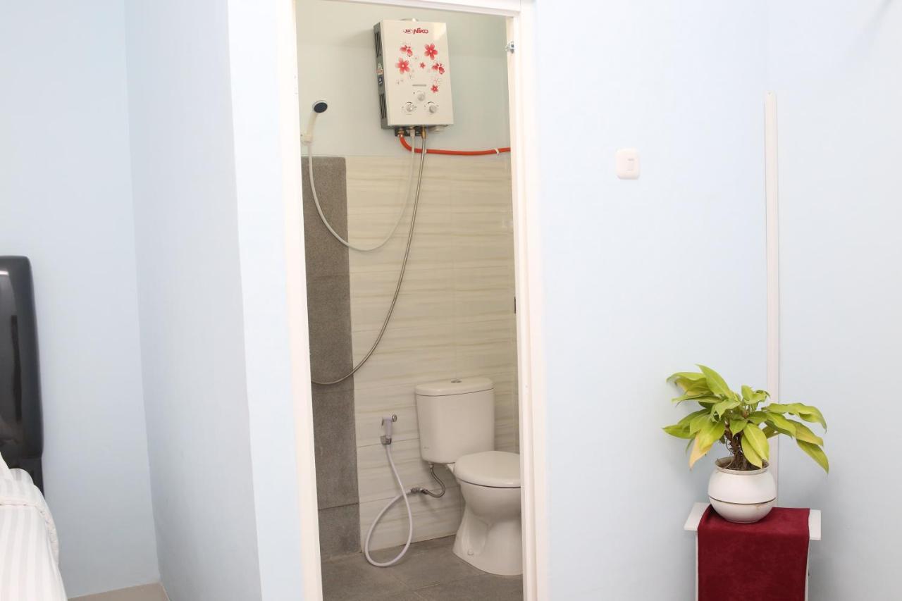 Reddoorz Syariah Near Suncity Mall มาดิอุน ภายนอก รูปภาพ